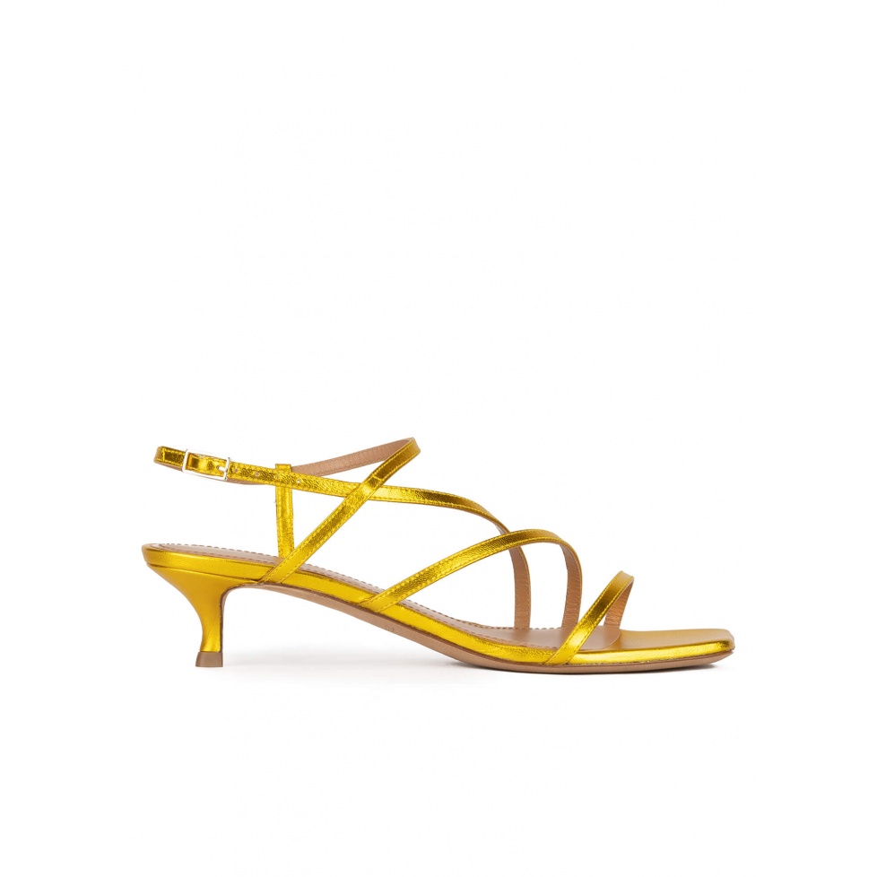 Yellow strappy mid heel sandals in metallic leather . PURA LOPEZ