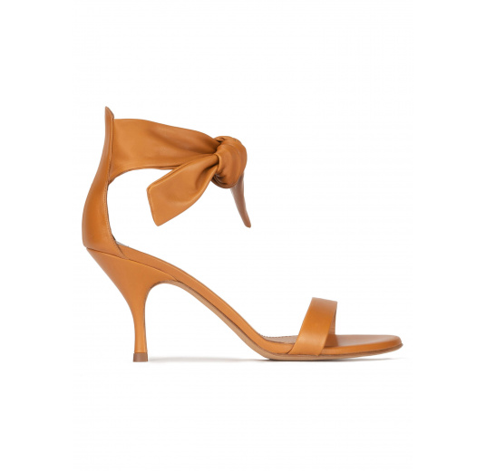 Mid heel sandals in camel leather with knotted ankle strap Pura López