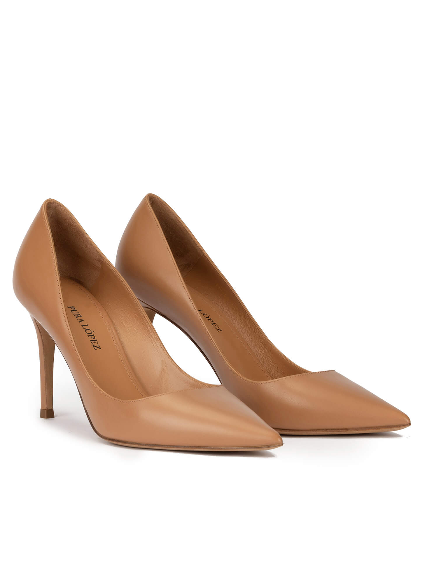Camel leather pointy toe pumps . PURA LOPEZ